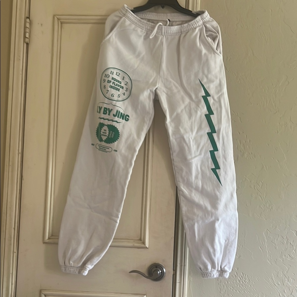 White Joggers with Green Graphics